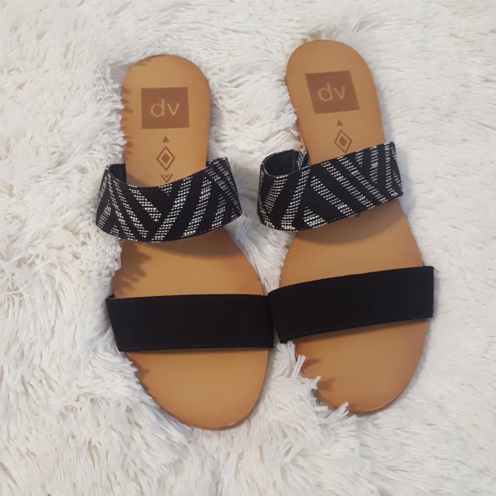 Black and white slider sandals
